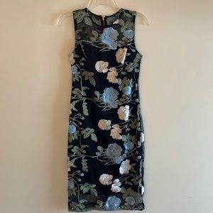 Calvin Klein black dress with blue, white, green flower embroidery. Size 4.